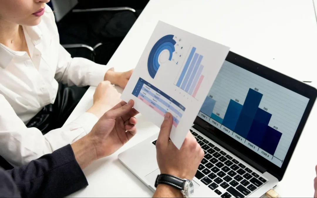 team working on the analytics of a project